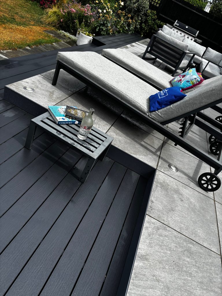 Relaxing on Deckorators decking in London designed by Karl Harrison