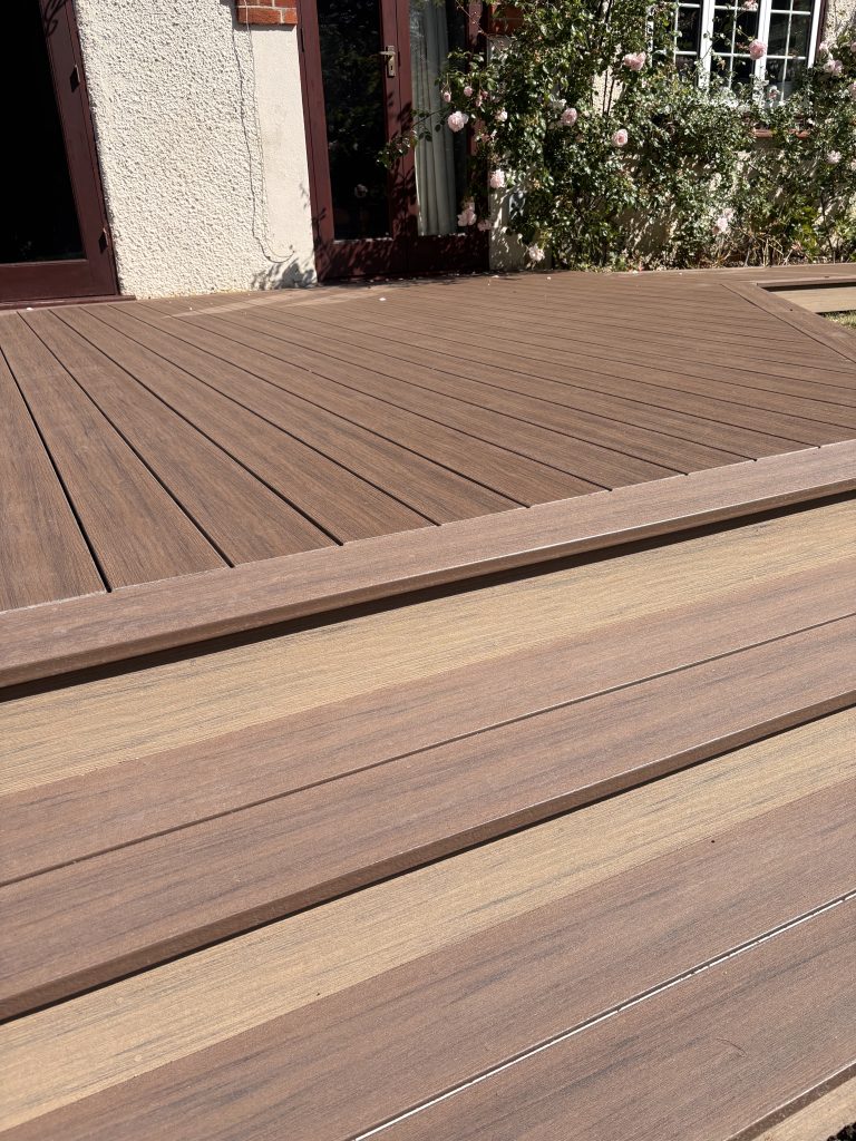Contrasting Tahiti step risers and fascias on a Deckorators composite deck